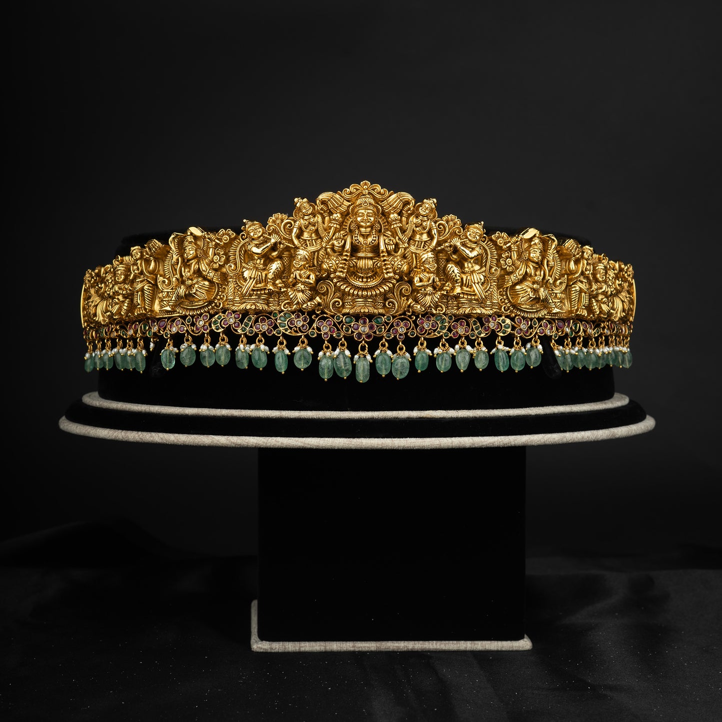 Giva nakshi vaddanam, gold plated 92.5 silver vaddanam featuring traditional south Indian designs adorning ruby and emerald stones