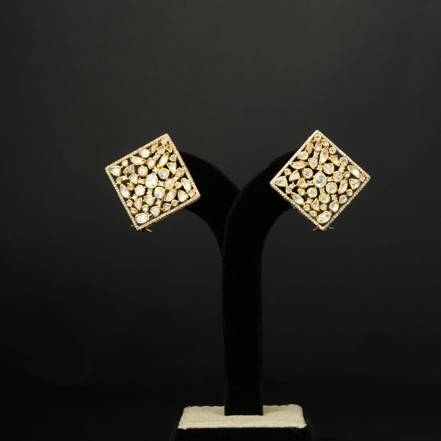 Ishanya Silver Stud Earrings, crafted with premium gold-plated 92.5 silver featuring timeless seed pearls, cubic zirconia stones, and moissanite