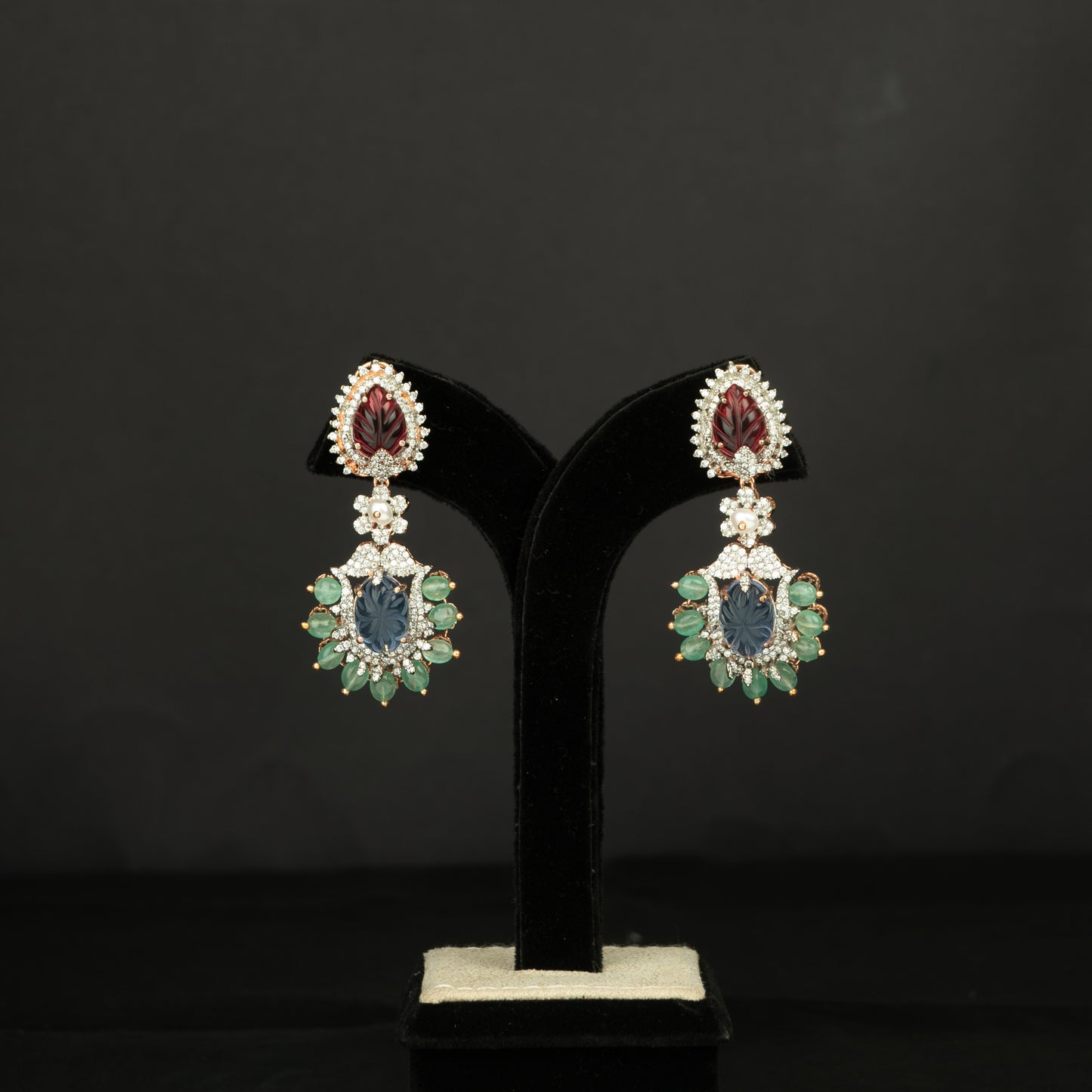 Xiti Silver Earrings, crafted with premium gold-plated 92.5 silver featuring timeless blue topaz, tourmaline, cubic zirconia, and ruby stones