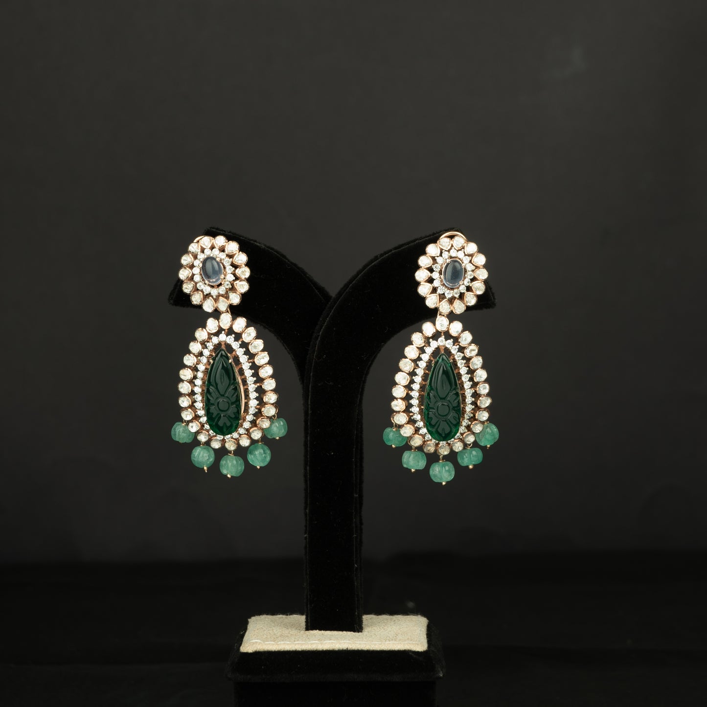 Vrishti Silver Earrings, crafted with premium gold-plated 92.5 silver featuring timeless tourmaline, cubic zirconia, and emerald stones