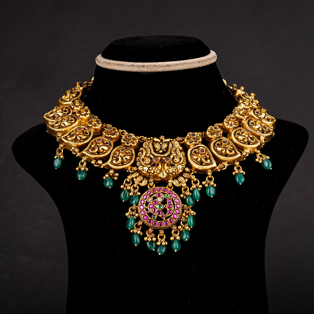 Takshi Gold-plated Kundan Necklace, Gold plated premium 92.5 silver gold-plated kundan necklace featuring timeless Emerald, Ruby potas, Kundan stones and rubies