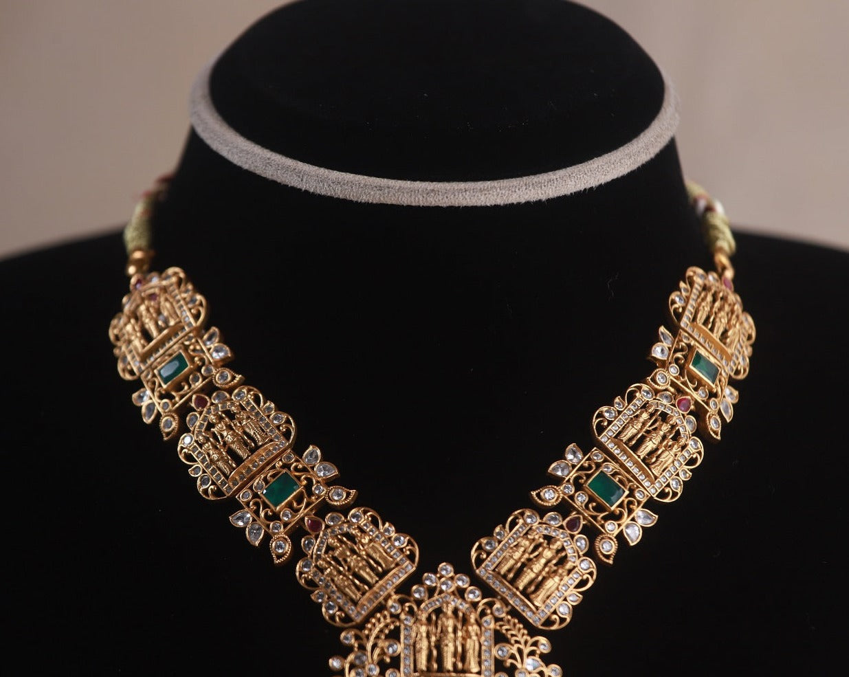 Aria Ram Parivar Nakshi Necklace, Gold plated 92.5 silver nakshi necklace featuring premium CZ, moissanite and emerald stones