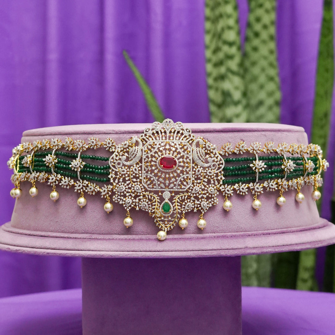 Anika CZ Vaddanam, Gold plated premium 92.5 silver vaddanam featuring timeless cubic zirconia, emerald, ruby stones and beads