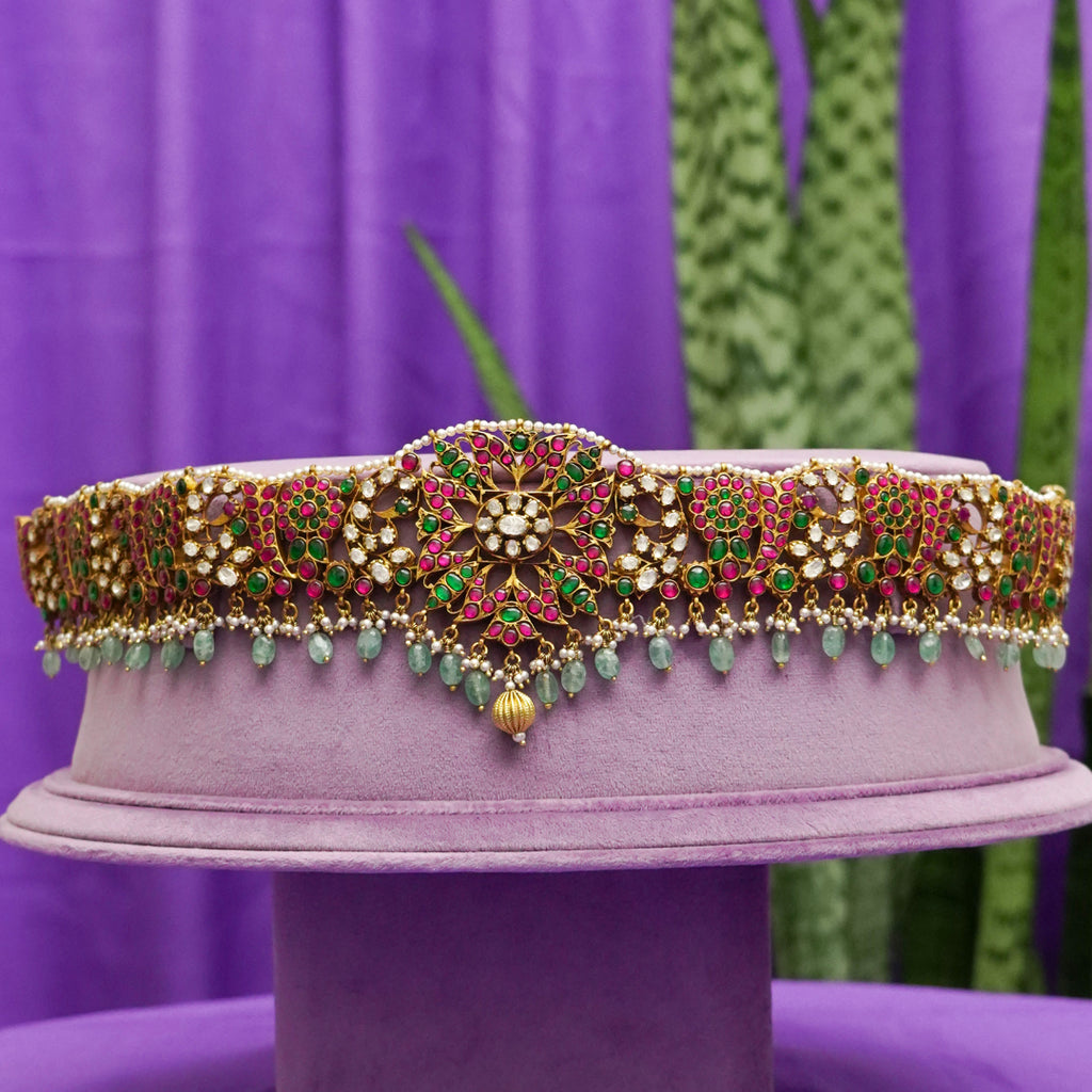 Arya Vaddanam, Gold plated premium 92.5 silver vaddanam featuring timeless ruby, moissanite, emerald stones, tourmaline, and seed pearls