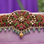 Arya Vaddanam, Gold plated premium 92.5 silver vaddanam featuring timeless ruby, moissanite, emerald stones, tourmaline, and seed pearls