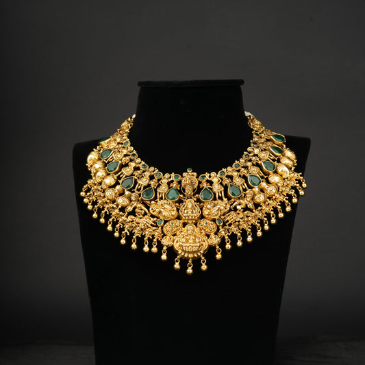 Dhristi Nakshi Necklace, Gold plated premium 92.5 silver necklace featuring timeless emeralds and emerald potas