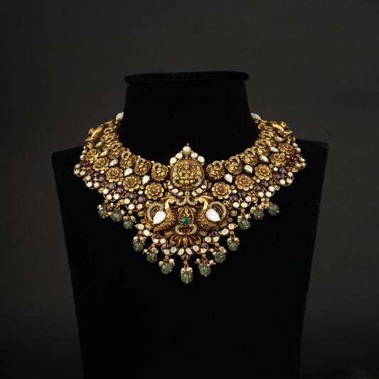 Veda Nakshi Necklace, Gold plated premium 92.5 silver necklace featuring timeless cubic zirconia, emerald, moissanite stones, and rubies