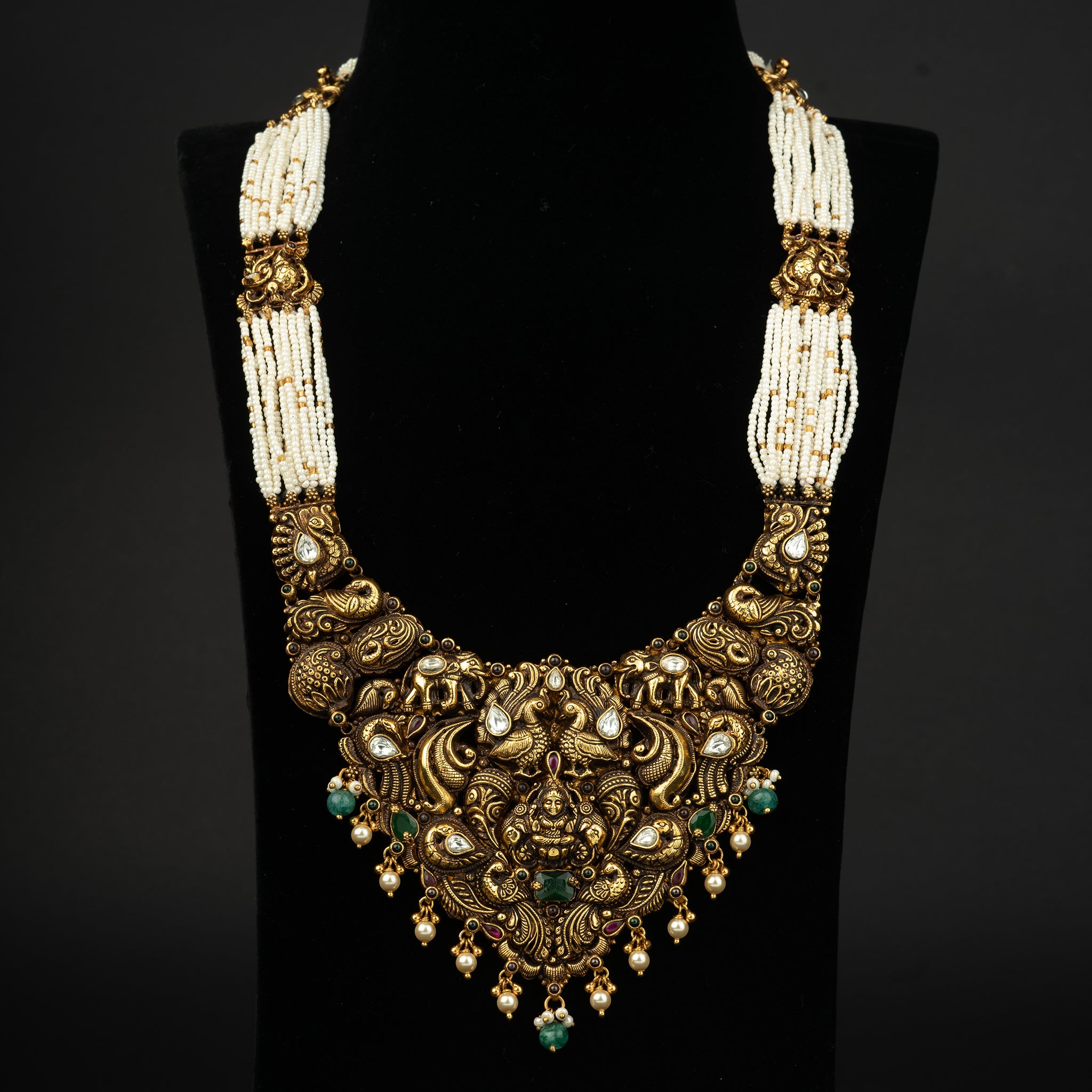 Tritiya antique haram, gold plated 92.5 silver haram featuring emerald and moissanite stones with seed pearls. Traditional gold plated haram