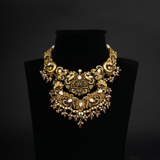 Eeshta Antique Gold-plated Kundan  Necklace, Gold plated premium 92.5 silver necklace featuring timeless kundan stones, emerald beads, and cubic zirconia stones