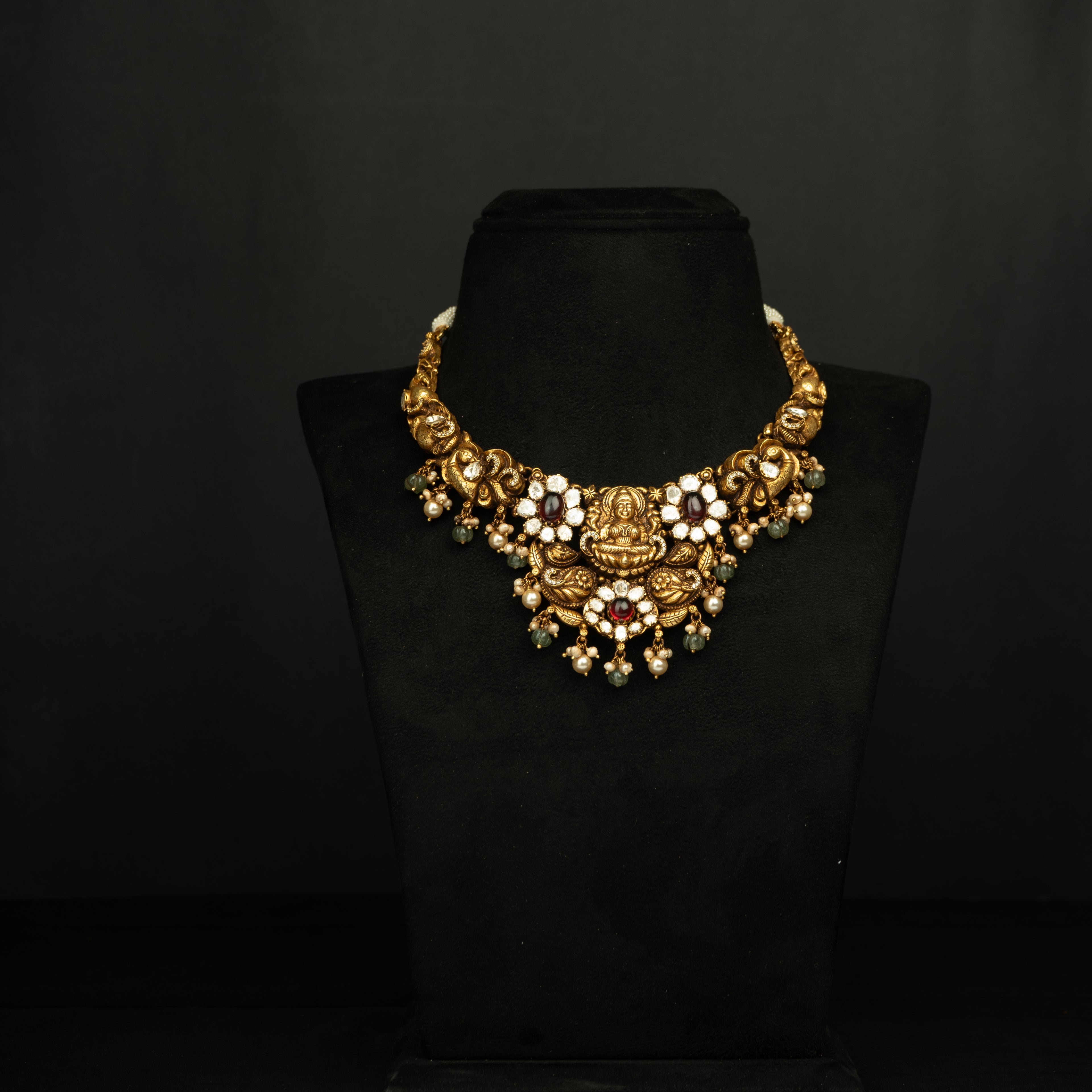 Aashvi Silver Necklace, Gold plated premium 92.5 silver necklace featuring timeless cubic zirconia, moissanite stones, tourmaline, seed pearls, and rubies