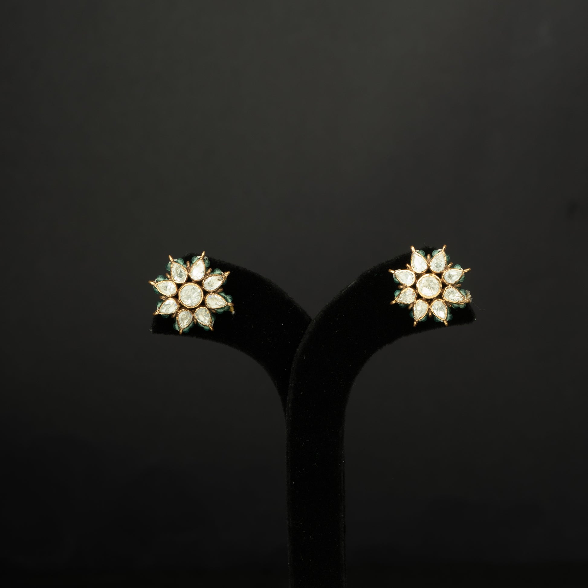 Urvi Silver Stud Earrings, crafted with premium gold-plated 92.5 silver featuring timeless moissanite stones and seed pearls