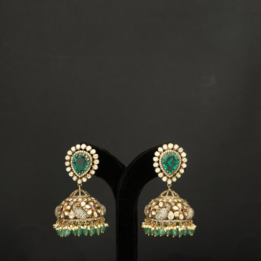 Zarna Silver Jhumka, crafted with premium gold-plated 92.5 silver featuring timeless tourmaline, cubic zirconia, moissanite, ruby potas, and emerald stones