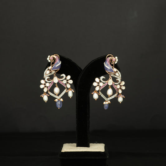 Charanya Silver Earrings, crafted with premium gold-plated 92.5 silver featuring timeless cubic zirconia stones, moissanite stones, beads, and tourmaline