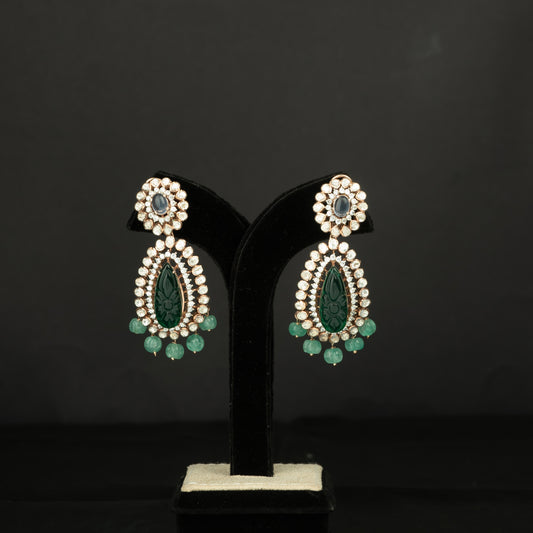 Vrishti Silver Earrings, crafted with premium gold-plated 92.5 silver featuring timeless tourmaline, cubic zirconia, and emerald stones