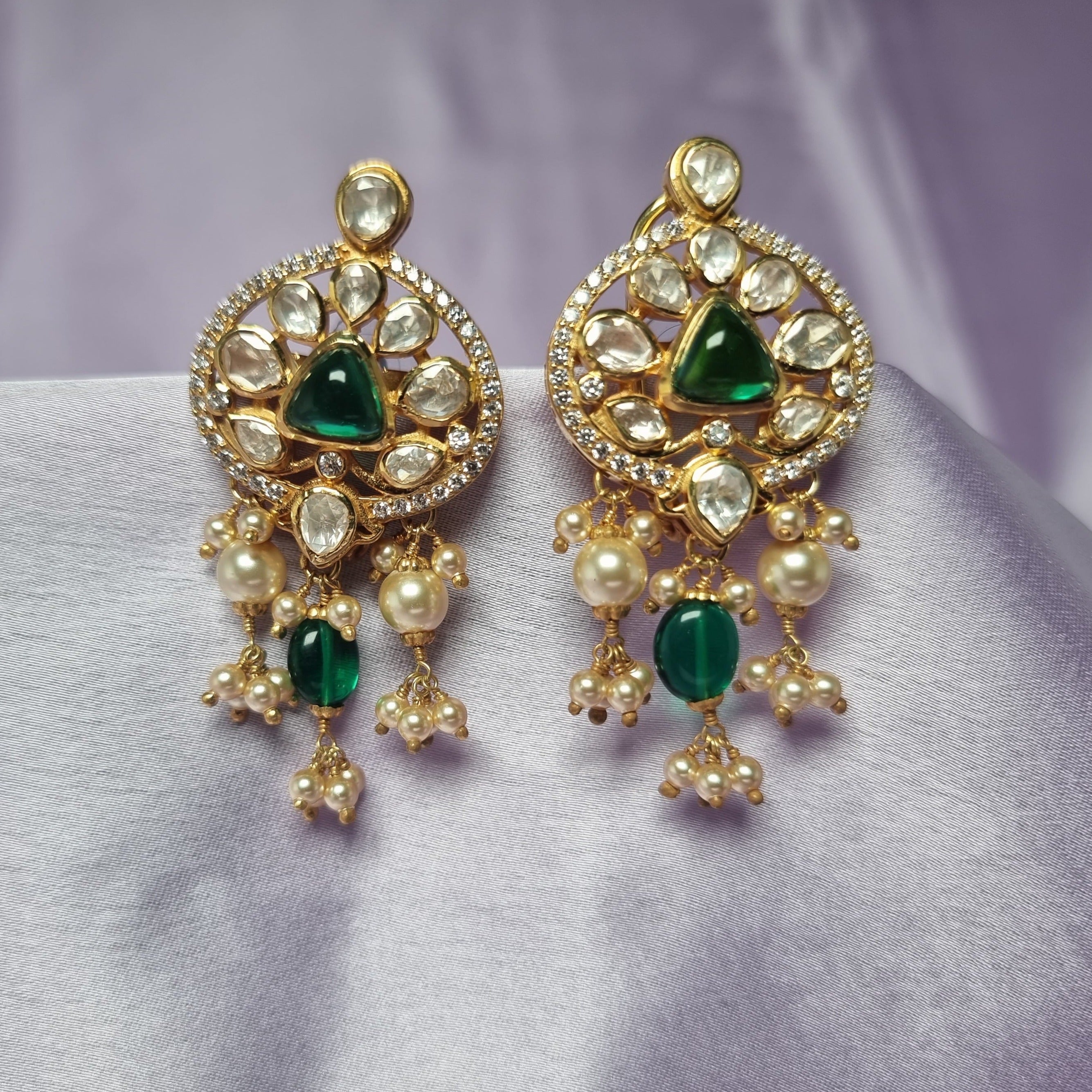 Shop the Ajmina kundan silver earrings from Amyra silver