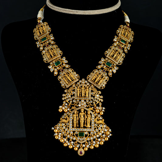 Aria Ram Parivar Nakshi Necklace, Gold plated 92.5 silver nakshi necklace featuring premium CZ, moissanite and emerald stones