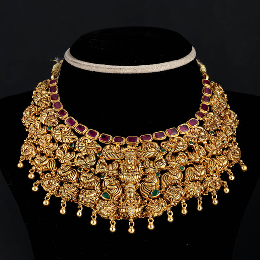 Veditha Nakshi Necklace, Gold plated premium 92.5 silver necklace featuring Cubic Zirconia Stones, Ruby, and Emerald stones