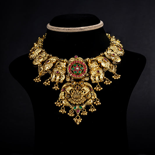 Kushi Nakshi Necklace, Gold plated premium 92.5 silver necklace featuring timeless emeralds, ruby potas, and rubies