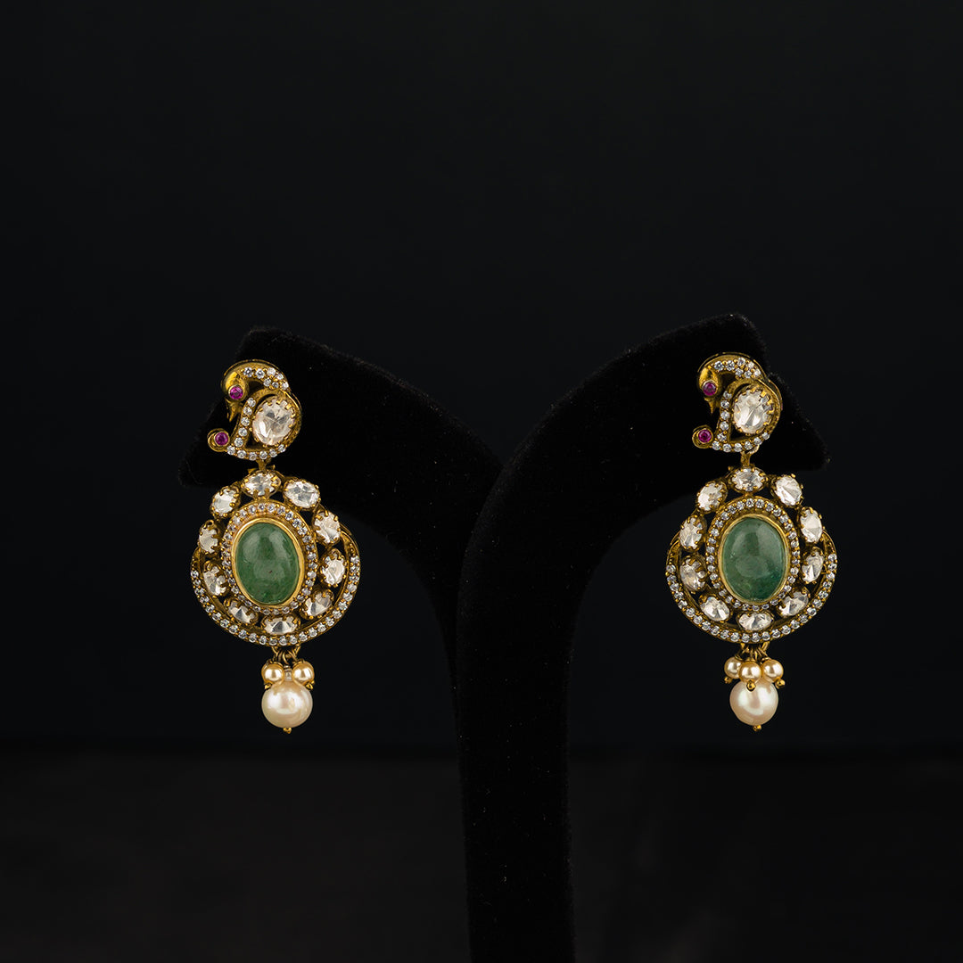 Anaisha moissanite silver earrings, beautifully crafted gold-plated silver earring featurng emerald and moissanite stones