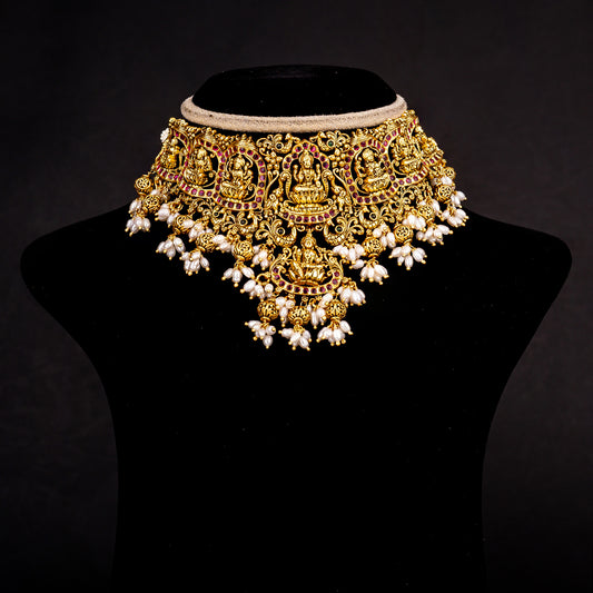 Eesha Nakshi Silver Choker, Gold-plated premium 92.5 silver choker necklace featuring timeless emerald stones, ruby potas and seeded pearls