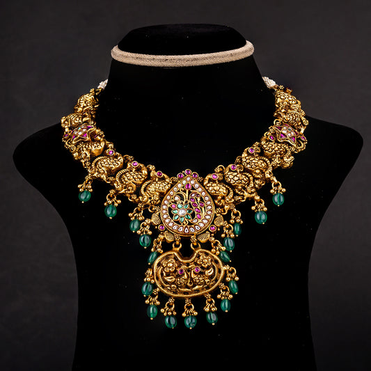 Janvi Gold-plated Kundan Necklace, Gold plated premium 92.5 silver necklace featuring timeless emeralds, kundan stones, and rubies
