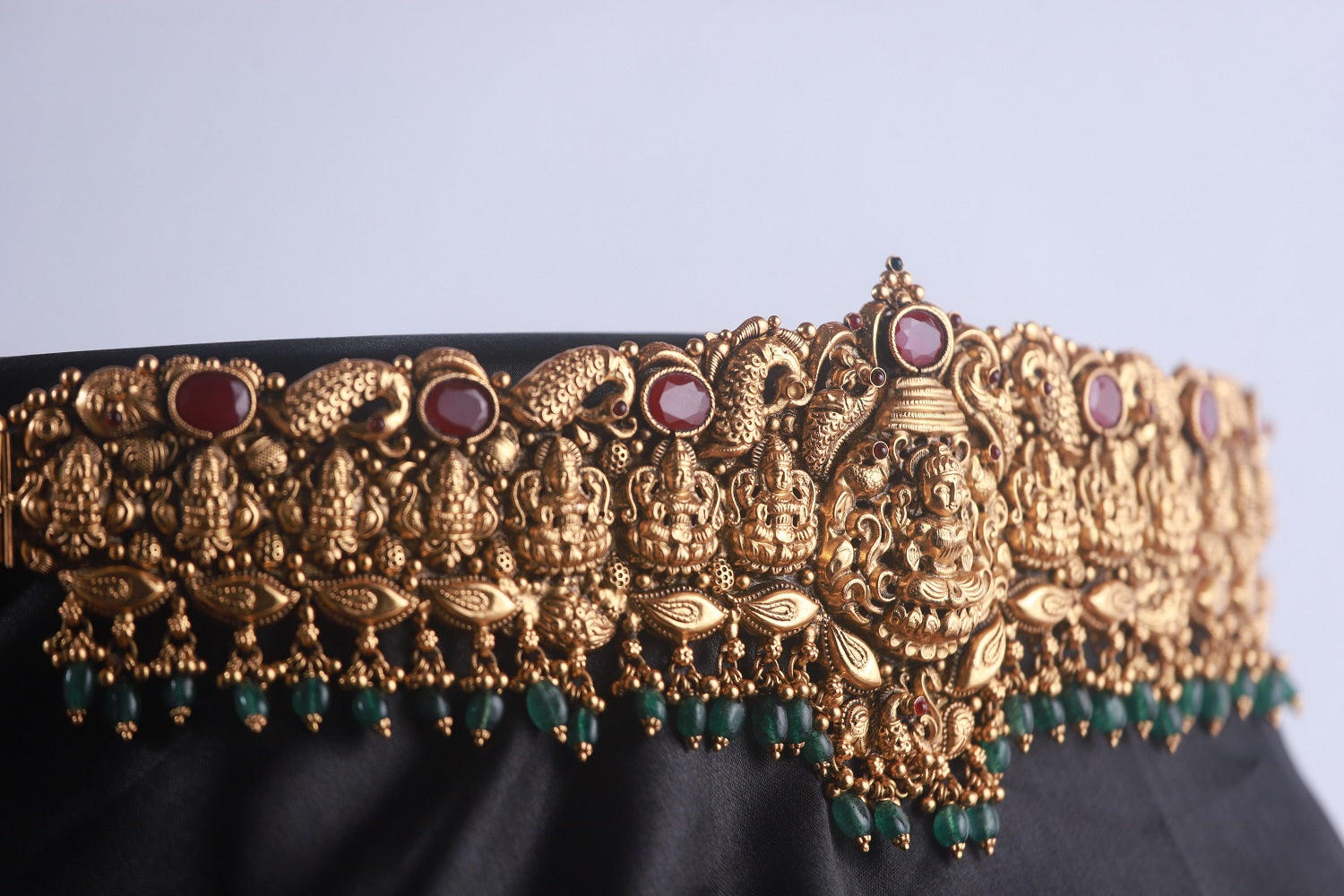 Vasudharini Vaddanam, Gold plated 92.5 silver vaddanam featuring intricate temple designs adorning beautiful ruby stones